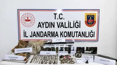 Aydın’ın Karacasu ilçesinde jandarmanın düzenlediği operasyonda 157 sikke ve tarihi