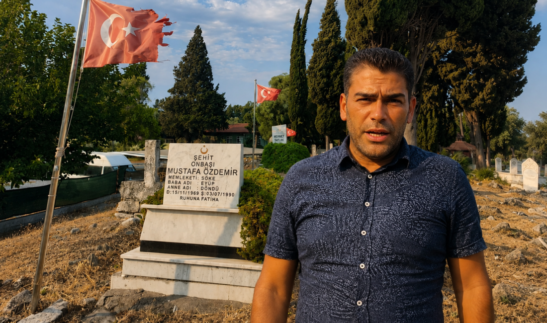 Aydın’ın Söke ilçesinde bir şehit mezarı başındaki Türk Bayrağı’nın yırtık