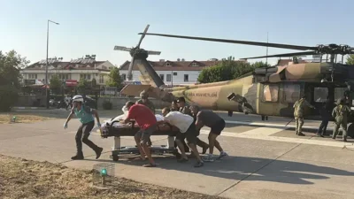 Muğla’nın Fethiye ilçesinde Babadağ’dan tandem uçuşu yapan yamaç paraşütü, havalandıktan